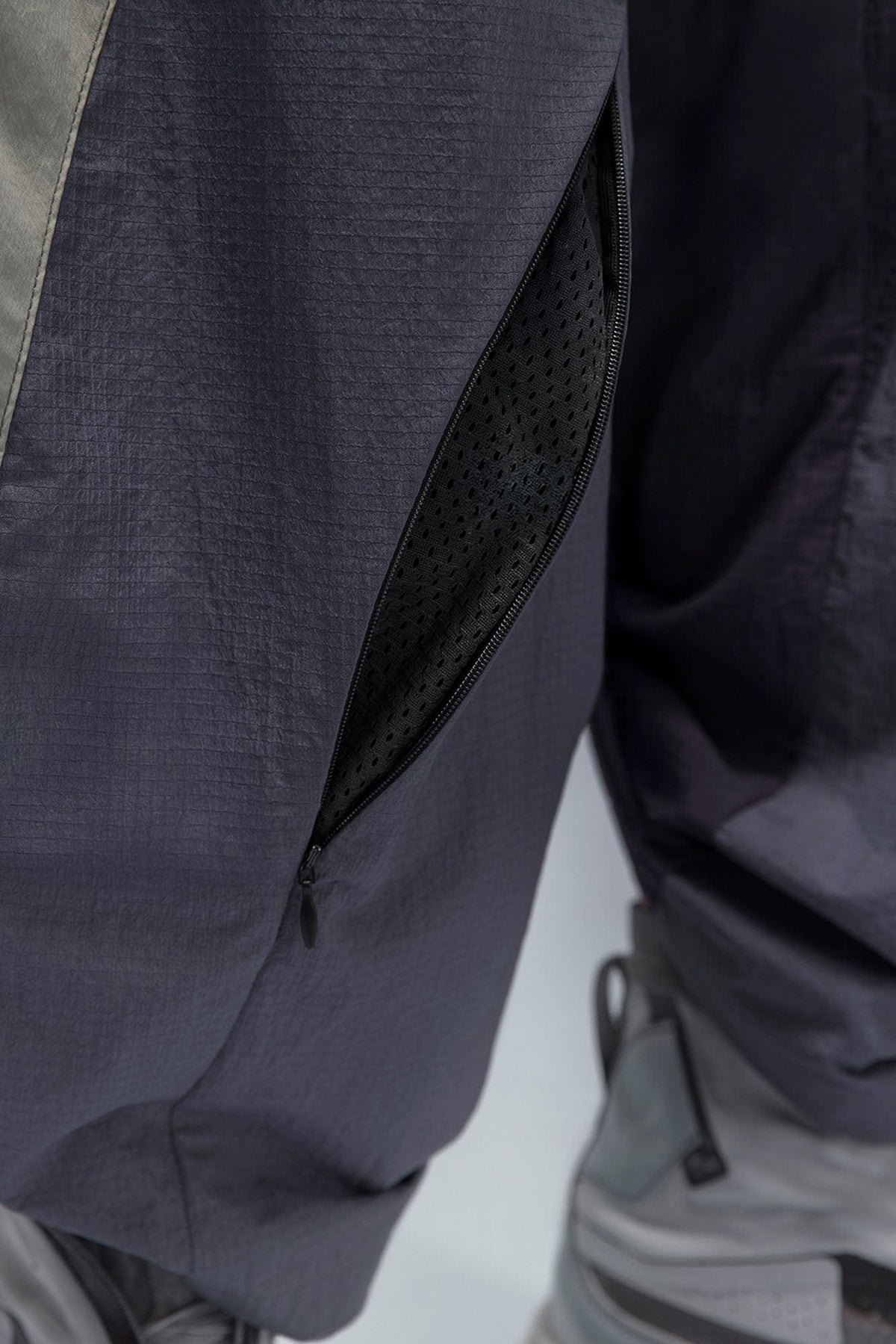 XIPHEVIL Deconstructed Contrast Panel Utility Curved Pants – photo 15 of 23